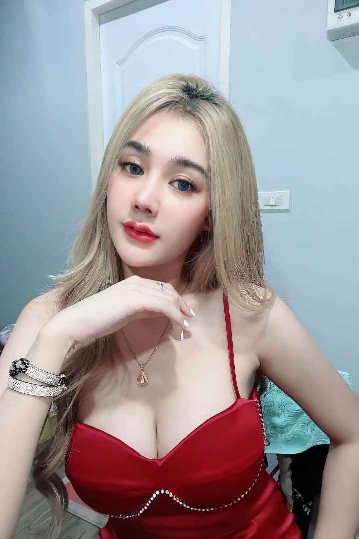 Attractive young woman in a red dress.